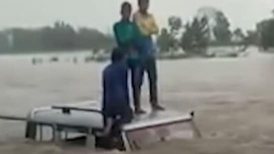 According to local reports, the villagers had asked the driver not to cross the river at a time when water level was high, but he did not listen to them.(Video screengrab)