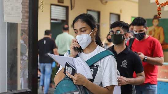 Students and international travellers wait in a queue to complete paperwork before receiving the Covid-19 vaccine dose, at a dedicated vaccination center for international travellers in New Delhi on Wednesday. (File Photo / PTI) Students and international travellers wait in a queue to complete paperwork before receiving the Covid-19 vaccine dose, at a dedicated vaccination center for international travellers in New Delhi on Wednesday. (File Photo / PTI)