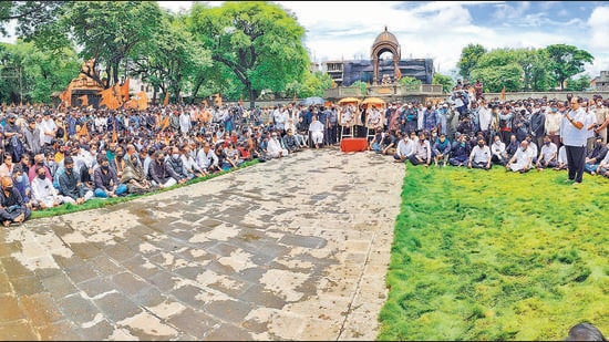 Protesters turned up in large numbers at the sit-in agitation organised by the Maratha Kranti Morcha at Shahu Samadhi Sthal, Nursery Baug area in Kolhapur, on Wednesday. (ANIL VELHAL/HT) Protesters turned up in large numbers at the sit-in agitation organised by the Maratha Kranti Morcha at Shahu Samadhi Sthal, Nursery Baug area in Kolhapur, on Wednesday. (ANIL VELHAL/HT)
