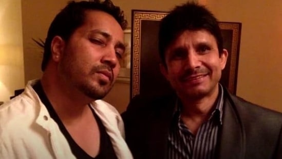 KRK and Mika Singh pose together.