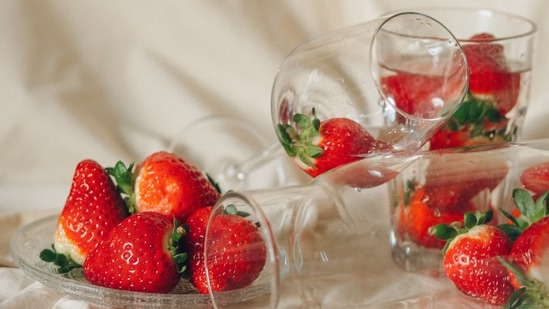 Strawberry tint: This will give your lips and cheeks a natural glow. In a bowl, mix half a spoon of strawberry juice with a few drops of your favourite essential oil. Put it in the refrigerator for 2 hours then use it.(Pexels)