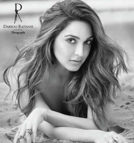 Kiara Advani posed in the sand for a black-and-white photo.