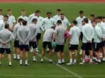 Spain coach Luis Enrique with the players during training