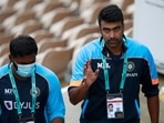 India's Ravichandran Ashwin, right, walks with a member of team support to cross over on the other side of field after rain delayed start of the first day of the World Test Championship final cricket match between New Zealand and India, at the Ageas Bowl in Southampton, England, Friday, June 18, 2021. India's Ravichandran Ashwin, right, walks with a member of team support to cross over on the other side of field after rain delayed start of the first day of the World Test Championship final cricket match between New Zealand and India, at the Ageas Bowl in Southampton, England, Friday, June 18, 2021.