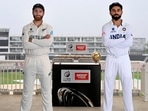 Indian cricket team captain Virat Kohli and his New Zealand counterpart Kane Williamson pose for a photograph with the World Test Championship (WTC) trophy ahead of their final match, in Southampton. (PTI) Indian cricket team captain Virat Kohli and his New Zealand counterpart Kane Williamson pose for a photograph with the World Test Championship (WTC) trophy ahead of their final match, in Southampton. (PTI)