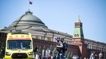 Russian National Guard (Rosgvardia) servicemen wearing face masks walk along Red Square past an ambulance in central Moscow on June 18, 2021.(AFP) Russian National Guard (Rosgvardia) servicemen wearing face masks walk along Red Square past an ambulance in central Moscow on June 18, 2021.(AFP)