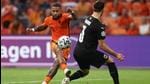 Netherland's forward Memphis Depay shoots as he is challenged by Austria's defender Aleksandar Dragovic during the UEFA EURO 2020 Group C football match. (AFP) Netherland's forward Memphis Depay shoots as he is challenged by Austria's defender Aleksandar Dragovic during the UEFA EURO 2020 Group C football match. (AFP)