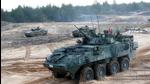 A Canadian Army LAV infantry fighting vehicle and Spanish Army Leopard 2 tanks take part in NATO enhanced Forward Presence battle group military exercise Crystal Arrow 2021 in Adazi, Latvia. (REUTERS) A Canadian Army LAV infantry fighting vehicle and Spanish Army Leopard 2 tanks take part in NATO enhanced Forward Presence battle group military exercise Crystal Arrow 2021 in Adazi, Latvia. (REUTERS)