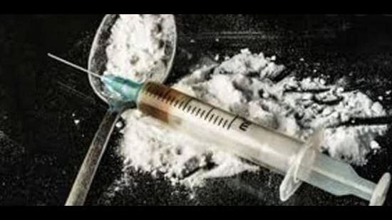 Drug, illegal weapon racket run from jail busted; student held with 1-kg heroin, arms Drug, illegal weapon racket run from jail busted; student held with 1-kg heroin, arms
