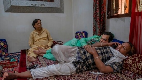 A transgender Kashmiri Shabana Pallo, left, Mehak Mir, center, and Chandini Sheikh rest at the end of a special meet of their community members in Srinagar, Indian controlled Kashmir, Thursday, June 3, 2021. (AP) A transgender Kashmiri Shabana Pallo, left, Mehak Mir, center, and Chandini Sheikh rest at the end of a special meet of their community members in Srinagar, Indian controlled Kashmir, Thursday, June 3, 2021. (AP)
