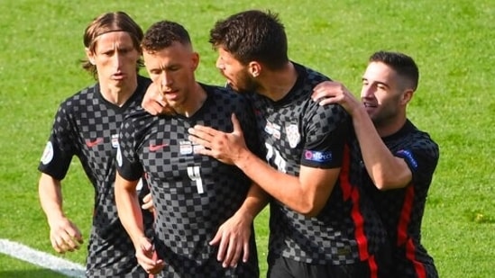 Ivan Perisic, second left, celebrates his goal with his teammates during the Euro 2020 soccer championship group D match between Croatia and Czech Republic, at Hampden Park stadium in Glasgow. (AP)