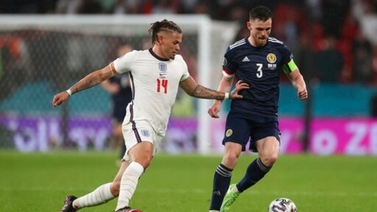 England's Kalvin Phillips, left, and Scotland's Andrew Robertson during the Euro 2020 soccer championship group D match.(AP)