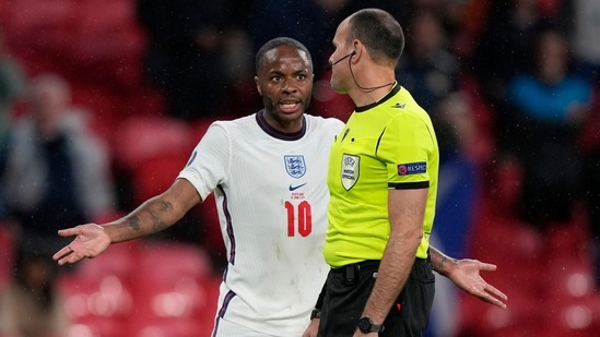 England's Raheem Sterling gestures to Referee Antonio Mateu Lahoz appealing for a penalty.(AP)