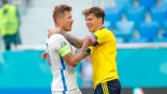 Slovakia's Juraj Kucka, left, and Sweden's Victor Lindeloef react with each other during the Euro 2020 soccer championship group E match between Sweden and Slovakia at Saint Petersburg Stadium in St. Petersburg, Russia, Friday, June 18, 2021. (AP Photo/Maxim Shemetov,Pool) (AP) Slovakia's Juraj Kucka, left, and Sweden's Victor Lindeloef react with each other during the Euro 2020 soccer championship group E match between Sweden and Slovakia at Saint Petersburg Stadium in St. Petersburg, Russia, Friday, June 18, 2021. (AP Photo/Maxim Shemetov,Pool) (AP)