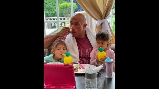 Happy Father's Day 2021: The image shows Dwayne ‘The Rock’ Johnson with his daughters Jasmine and Tiana.(Instagram/@therock)