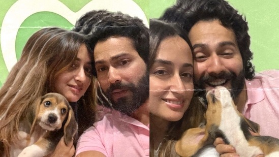 Varun Dhawan and Natasha Dalal pose with their pup Joey.