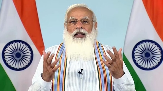 Prime Minister Narendra Mod also sought to assure that the central government is committed to providing free Covid vaccination for everyone starting June 21. (ANI) Prime Minister Narendra Mod also sought to assure that the central government is committed to providing free Covid vaccination for everyone starting June 21. (ANI)