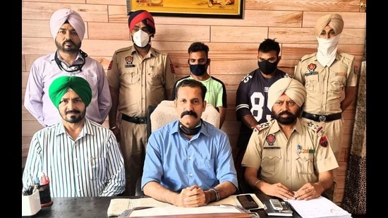 The accused in custody of the special task force on Friday. (HT Photo)