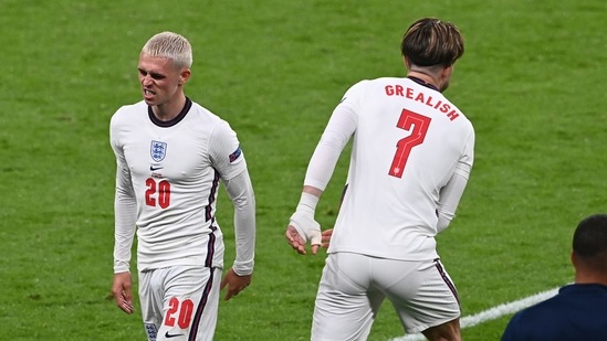England's Phil Foden, left, leaves the pitch during the Euro 2020 soccer championship group D match.(AP)