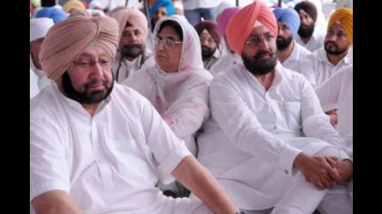 Capt Amarinder Singh and Partap Singh Bajwa at a bhog ceremony in 2015. Capt Amarinder Singh and Partap Singh Bajwa at a bhog ceremony in 2015.