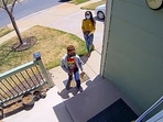 The image shows the mom and her son surprising their neighbour.