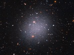Nasa Hubble Space Telescope snapshot reveals an unusual "see-through" galaxy.
