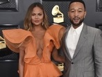Chrissy Teigen with John Legend at the 62nd annual Grammy Awards.(Jordan Strauss/Invision/AP) Chrissy Teigen with John Legend at the 62nd annual Grammy Awards.(Jordan Strauss/Invision/AP)