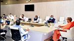Uttar Pradesh chief minister Yogi Adityanath at a Covid review meeting. (PTI FILE PHOTO) Uttar Pradesh chief minister Yogi Adityanath at a Covid review meeting. (PTI FILE PHOTO)