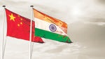 China India national flag cloth fabric waving on the sky with beautiful sun light - Image (Shutterstock) China India national flag cloth fabric waving on the sky with beautiful sun light - Image (Shutterstock)