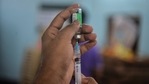 After five minutes, another ANM, giving shots to the 18-45 years age group, administered her a dose of Covishield to Sunila Devi, After five minutes, another ANM, giving shots to the 18-45 years age group, administered her a dose of Covishield to Sunila Devi,