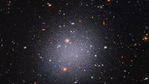 Nasa Hubble Space Telescope snapshot reveals an unusual "see-through" galaxy.(Nasa) Nasa Hubble Space Telescope snapshot reveals an unusual "see-through" galaxy.(Nasa)
