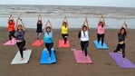 Surat: Women perform yoga on a beach ahead of International Yoga Day in Surat, Saturday, June 19, 2021. (PTI) Surat: Women perform yoga on a beach ahead of International Yoga Day in Surat, Saturday, June 19, 2021. (PTI)