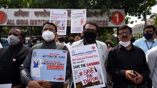 Members of IMA demonstrating with placards, demanding a central law to protect doctors against violence, outside AIIMS in New Delhi. (Amal KS/HT PHOTO) Members of IMA demonstrating with placards, demanding a central law to protect doctors against violence, outside AIIMS in New Delhi. (Amal KS/HT PHOTO)