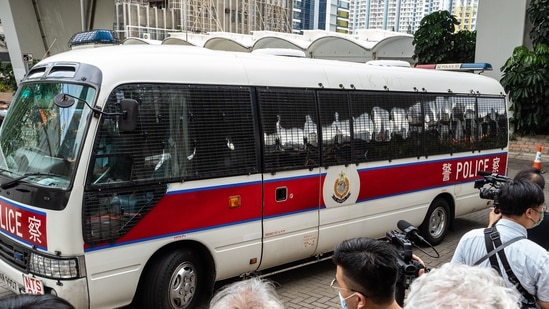 A police vehicle arrives ahead of a court appearance by Next Digital Ltd. CEO Cheung Kim-hung and Apple Daily Editor-in-Chief Ryan Law at the West Kowloon Magistrates' Courts in Hong Kong on June 19, 2021. (Bloomberg) A police vehicle arrives ahead of a court appearance by Next Digital Ltd. CEO Cheung Kim-hung and Apple Daily Editor-in-Chief Ryan Law at the West Kowloon Magistrates' Courts in Hong Kong on June 19, 2021. (Bloomberg)
