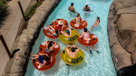 People ride on tubes at Six Flags Hurricane Harbor water park in Concord, California on June 17. The hot weather can be tied to the drought drying out the landscape. Normally, some of the sun’s heat evaporates moisture in the soil, but scientists say the Western soil is so dry that instead that energy makes the air even warmer.(David Paul Morris / Bloomberg)