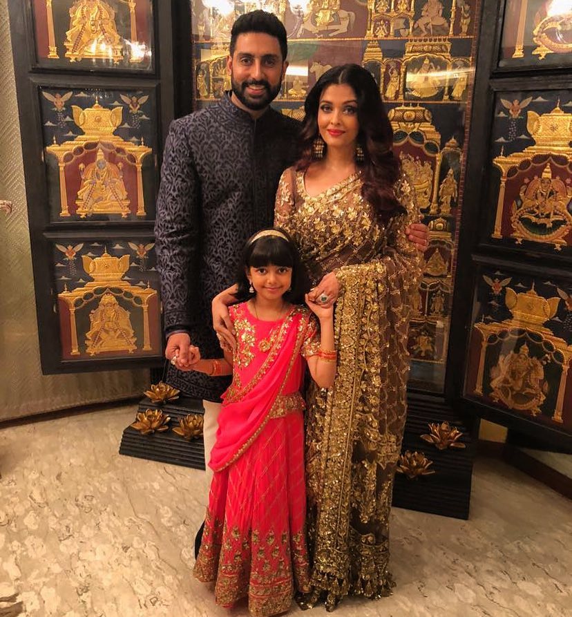 Abhishek Bachchan and Aishwarya Rai pose with their daughter Aaradhya at Jalsa.