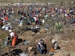 Thousands flock to rural South African village in hope of mining diamond only to find quartz crystals.(Reuters)