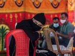 A person waits to see a doctor during a free medical camp for transgender persons organized by a voluntary organization in Srinagar.(AP) A person waits to see a doctor during a free medical camp for transgender persons organized by a voluntary organization in Srinagar.(AP)