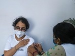 A beneficiary gets vaccinated at a vaccination centre in New Delhi. (AFP) A beneficiary gets vaccinated at a vaccination centre in New Delhi. (AFP)