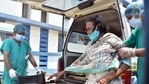 West Bengal: Health workers help a Covid-19 patient at a government hospital in Kolkata. (ANI) West Bengal: Health workers help a Covid-19 patient at a government hospital in Kolkata. (ANI)