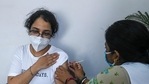 A beneficiary gets vaccinated at a vaccination centre in New Delhi. (AFP) A beneficiary gets vaccinated at a vaccination centre in New Delhi. (AFP)