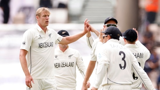  New Zealand's Kyle Jamieson celebrates with teammates after taking the wicket of India's Ishant Sharma. (Action Images via Reuters)