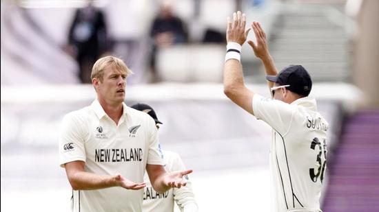 New Zealand's Kyle Jamieson celebrates with teammates after taking the wicket of India's Ishant Sharma. (Action Images via Reuters) New Zealand's Kyle Jamieson celebrates with teammates after taking the wicket of India's Ishant Sharma. (Action Images via Reuters)