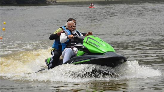 Haryana chief minister Manohar Lal Khattar trying his hand at jet skiing at Tikkar Taal in Morni Hills, Panchkula, on Sunday. (SANT ARORA/HT) Haryana chief minister Manohar Lal Khattar trying his hand at jet skiing at Tikkar Taal in Morni Hills, Panchkula, on Sunday. (SANT ARORA/HT)