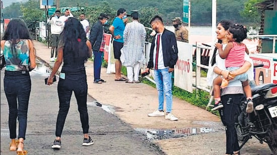 Tourists near Venna lake in Mahabaleshwar, on Saturday. (HT PHOTO) Tourists near Venna lake in Mahabaleshwar, on Saturday. (HT PHOTO)