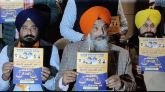 Prem Singh Chandumajra (centre) in Mohali in February this year. Prem Singh Chandumajra (centre) in Mohali in February this year.