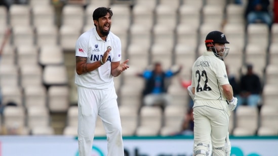 India's Ishant Sharma, left, celebrates the dismissal of New Zealand's Devon Conway.(AP)