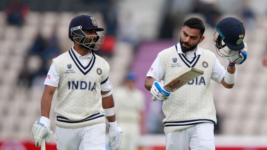 India's captain Virat Kohli, right, and batting partner Ajinkya Rahane walk off the field for tea during the second day of the World Test Championship final cricket match between New Zealand and India, at the Rose Bowl in Southampton, England, Saturday, June 19, 2021. (AP) India's captain Virat Kohli, right, and batting partner Ajinkya Rahane walk off the field for tea during the second day of the World Test Championship final cricket match between New Zealand and India, at the Rose Bowl in Southampton, England, Saturday, June 19, 2021. (AP)