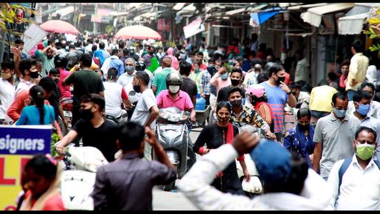 A huge crowd of people seen flouting social distancing norms after relaxation in Covid-19 lockdown in Gurugram on Sunday. (ANI)