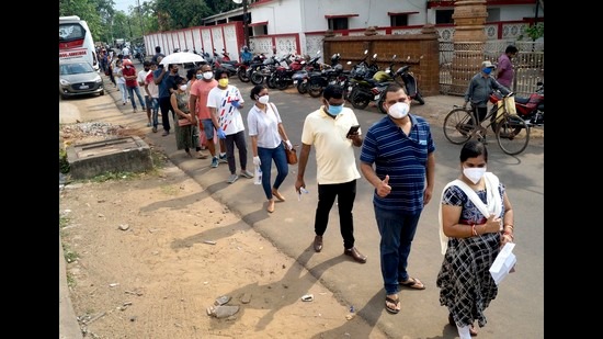 People stand in a queue to receive a dose of the Covid-19 vaccine during a vaccination drive in Odisha’s capital Bhubaneswar. (ANI) People stand in a queue to receive a dose of the Covid-19 vaccine during a vaccination drive in Odisha’s capital Bhubaneswar. (ANI)